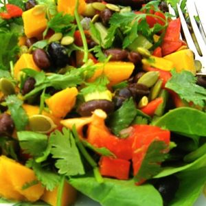 A salad with mango, black beans and a hint of chili perfect for Independence day.